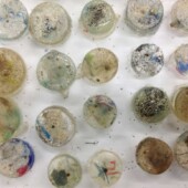 Cast pins with plastic detritus