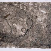 Handmade paper with steel netting and rope in it