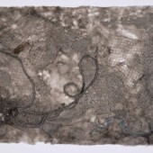 Handmade paper with steel netting and rope in it