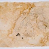 Handmade paper with detritus an flecks of steel