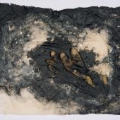 A 2D art piece made from handmade paper and a glove