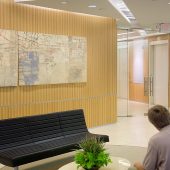 A man and woman sitting in a waiting room
