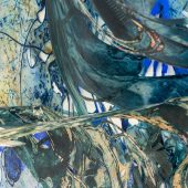 Close up of a mixed media art piece on paper