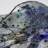 A hand cut handmade paper and pulp painting