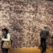 four people in an art gallery