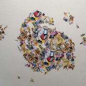 Detail of the vinyl wallpaper, hand cut A collage of pieces of wallpaper