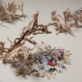 Detail of Vinyl wallpaper with laser cut metal vinyl wall paper and laser cut metal pieces