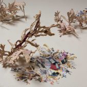 Detail of Vinyl wallpaper with laser cut metal vinyl wall paper and laser cut metal pieces