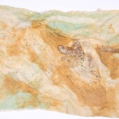 <em>Johnson’s Bayou 14</em> Art work made from handmade paper and a latex glove