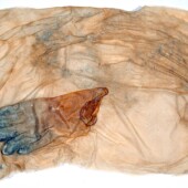 <em>Johnson’s Bayou 7</em> Art work made from handmade paper and a latex glove