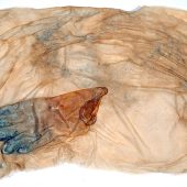 <em>Johnson’s Bayou 7</em> Art work made from handmade paper and a latex glove