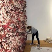 Installing in Venice Joan Hall working on The Invasion of Hull Cove 3D art installation.