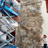 Front of work as being taken to the wall