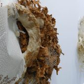 Two mixed media art sculptures made from paper and mylar