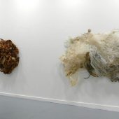 Two mixed media sculptures made from paper and mylar