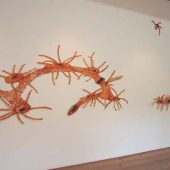 Orange art sculptures made from paper