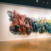 A large multi-colored 3D mixed media art sculpture