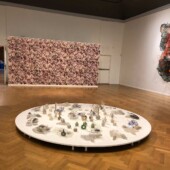 Sand in glass bottles and a 3D art wall exhibit