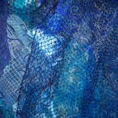 Section of a wall hanging made from paper, mylar and netting