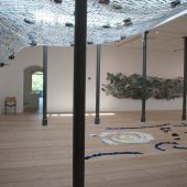 An art exhibit with mixed media art sculptures