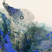 Close up of a blue and green mixed media art piece